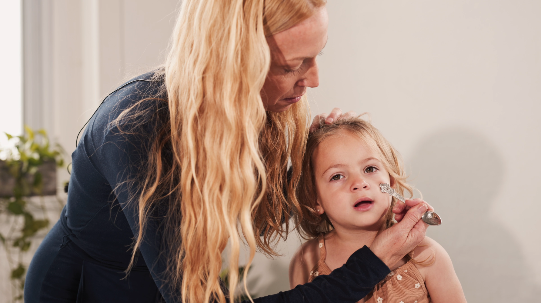Megan sharing a gentle healing moment with a child